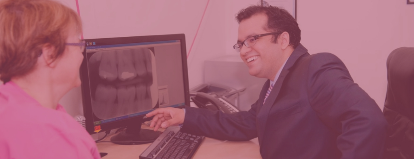 Nadim chatting to a patient during their consultation